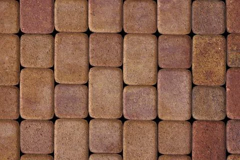 Flat texture and full-frame background of brown cuboid concrete brick pavement 스톡 사진