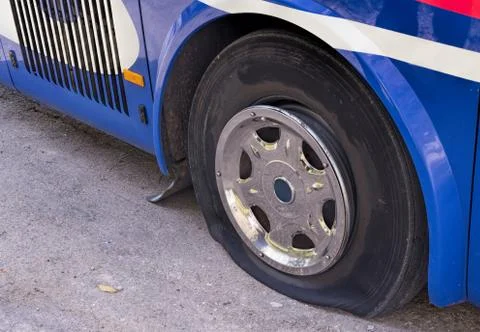 Flat tire on a bus Stock Photos