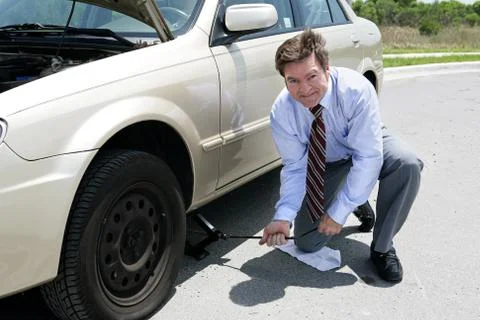 Flat Tire - Jack Stock Photos