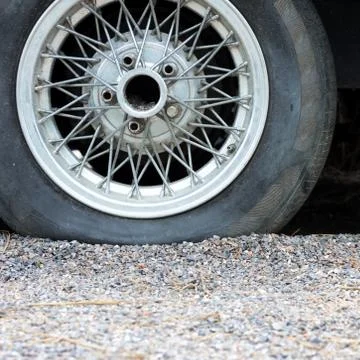 Flat tire Stock Photos