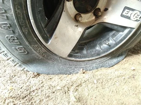 Flat tire Stock Photos