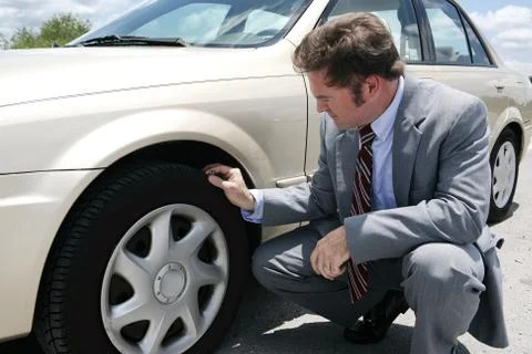 Flat Tire with Screw Stock Photos