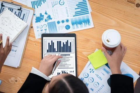 Flat top view analyst team use BI dashboard for data analysis. Concord Stock Photos