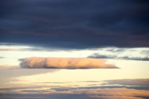 A flat topped cloud over Barrow in Furness, Cumbria, UK. Stock Photos