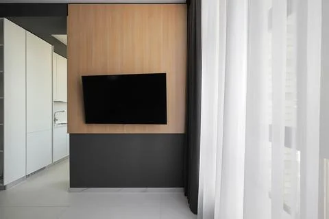 Flat TV hangs on the wall Foto stock