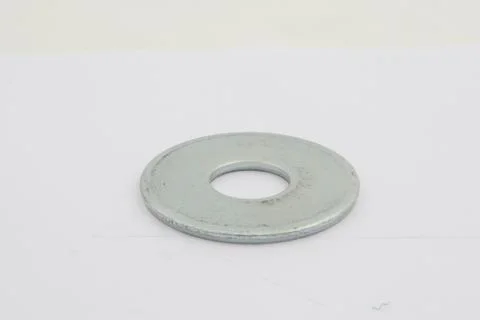 Flat washers for fasteners, on a white background Stock Photos
