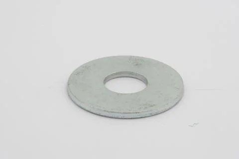 Flat washers for fasteners, on a white background Stock Photos