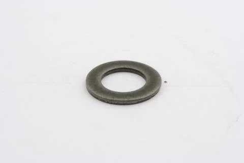 Flat washers for fasteners, on a white background Stock Photos