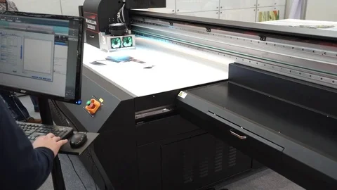 Flatbead UV printer Magellan, close up view of printing process Stock Footage 83372237