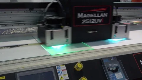 Flatbead UV printer Magellan, close up view of printing process Stock Footage 83422272