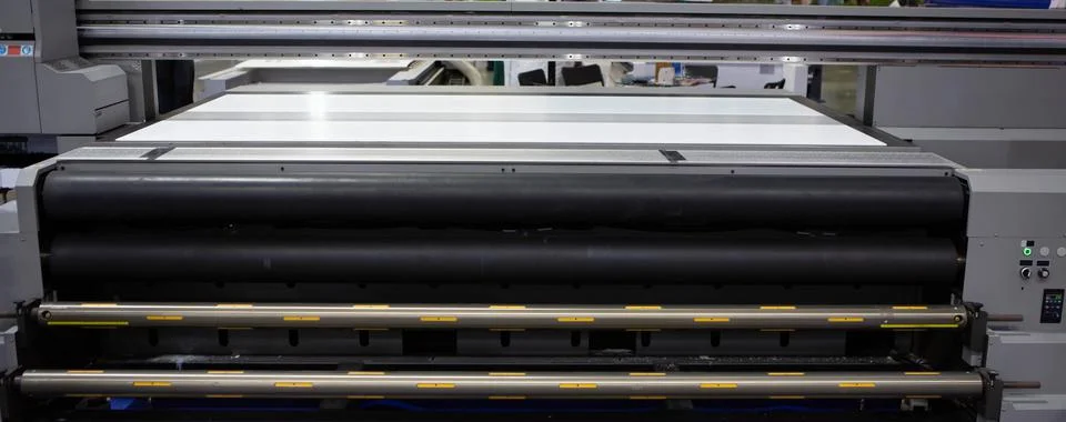 Flatbed and roll UV printer Stock Photos