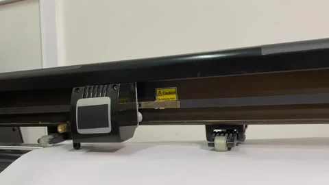 Flatbed plotter for cutting.Plotter processing Stock Footage 322617230