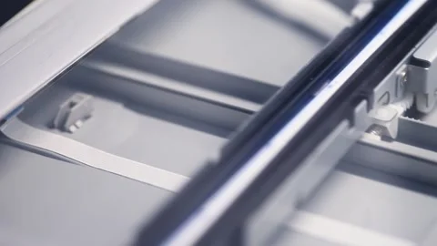 Flatbed scanner glass surface close up with clean reflective lighting and g.. Stock Footage 334571012