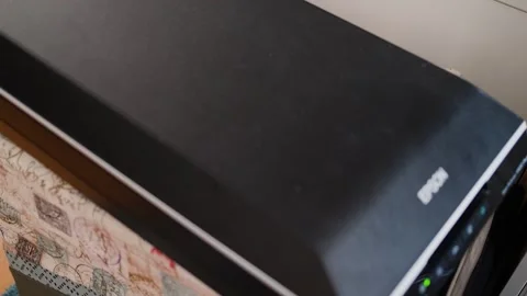 A flatbed scanner ready for document or photo scanning on a desk in a home Stock Footage 292590913