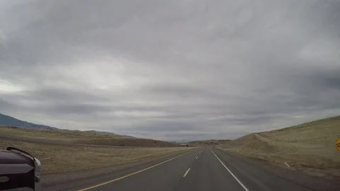 Flatbed Semi Highway Pass | Elevated POV Driving Shot  Stock Footage 72522230