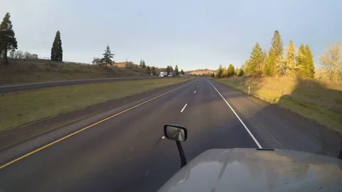 FLATBED SEMI PASS | Elevated POV Driving Shot | Rural California, USA Stock Footage 72521744