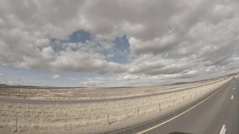 Flatbed Semi-Truck Interstate Pass Stock Footage 69931881