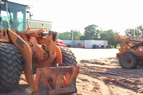 Flatbed Semi Truck Tows Some Heavy Machinery Front End Loader Stock Footage 141034