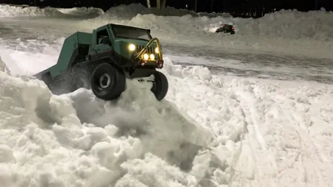 Flatbed toy truck model stuck in the snow. Stock Footage 207400672