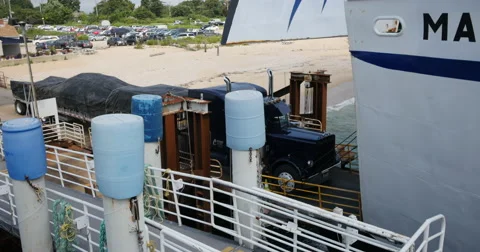 Flatbed truck loading onto a ferry, Long Island, New York Video stock 57651628