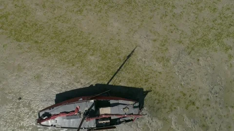 Flatbottom sailingboat beaching at the island of Terschelling, the Netherlands Stock Footage 289907158