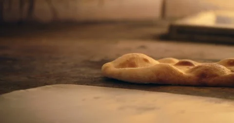 Flatbread Cooking in Fire Oven Stock-Footage 129849584