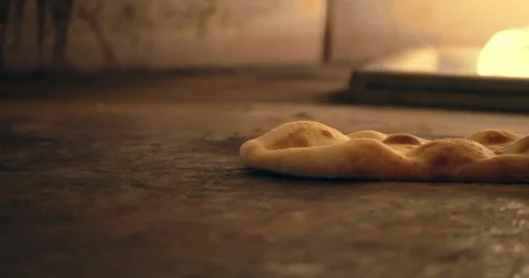 Flatbread Cooking in Fire Oven Stock-Footage 129849778