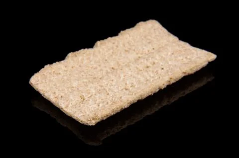 Flatbread grain cake isolated on the black Stock Photos