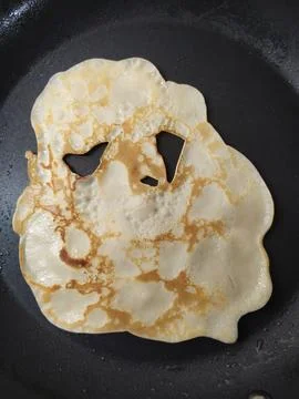 Flatbread pancake with funny eyes Stock Photos