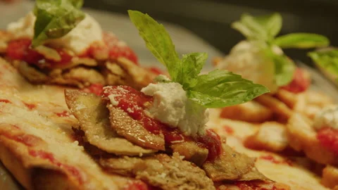 Flatbread pizza slide into glass counter pizza shop italian restaurant closeup Stock Footage 238804536