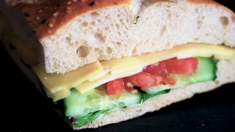 Flatbread sandwich with cheese tomato cucumber salad and sauce 1 Stock Footage 120704041