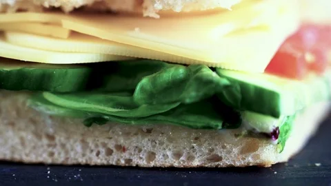 Flatbread sandwich with cheese tomato cucumber salad and sauce 4 Stock Footage 120705260