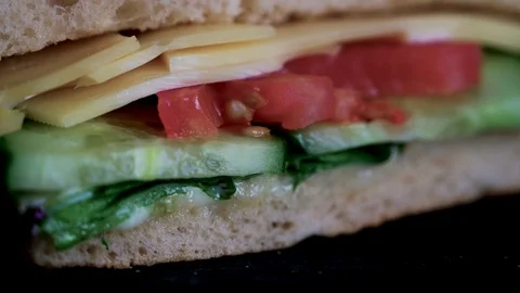 Flatbread sandwich with cheese tomato cucumber salad and sauce 3 Stock Footage 120705334