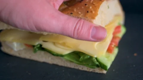 Flatbread sandwich with cheese tomato cucumber salad and sauce 6 Stock Footage 120705928