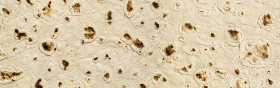Flatbread texture with roasted spots forming pattern Stock Photos