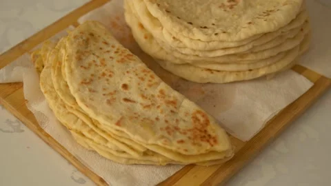 Flatbread, Turkish pastries, oily flatbread, unique to the Sorgun district .. Video stock 252421259