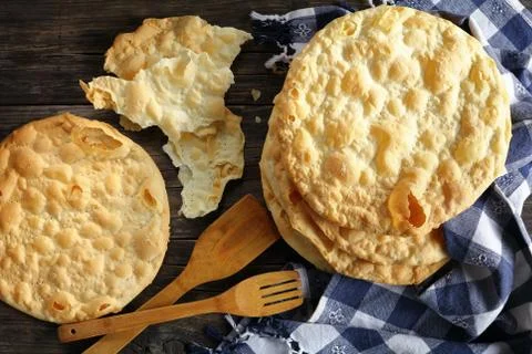 Flatbreads on wooden table, top view Stock Photos