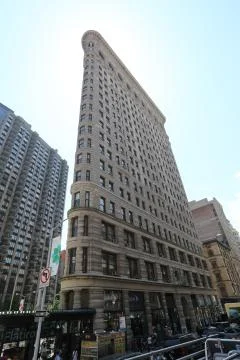 Flatiron Building on blue sky background. America, New York City - May 10, 2017 Stock Photos