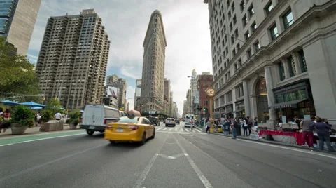 Flatiron Building Manhattan New York City NYC Taxis Cabs Taxicabs 5th Ave Fifth Stock Footage