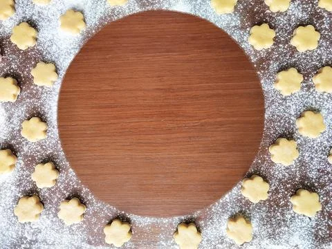 Flatlay baking background with raw cookies, flour and place for text Stock Photos