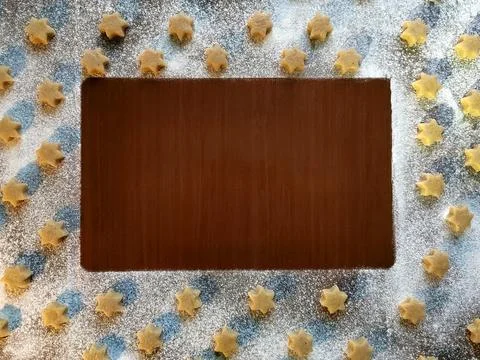 Flatlay baking background with raw cookies, flour and place for text Foto stock