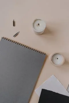 Flatlay blank paper sheet pad, fountain pen, ink on beige background. Minimal Stock Photos