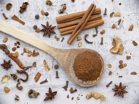 Flatlay of cinnamon and various dried spices. Stock Photos