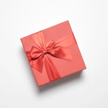 Flatlay composition with gift box. Greeting card. A holiday gift. Red box with a Stock Photos