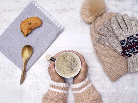 Flatlay of holding cup of coffee. Stock Photos