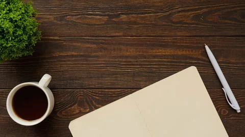 Flatlay with office items and place for text. Layout on a wooden background. Stock Photos