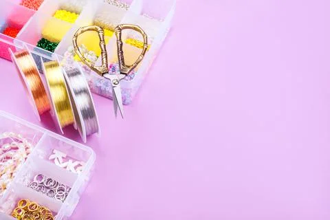 Flatlay of seed beads with tools for making jewelry Stock Photos