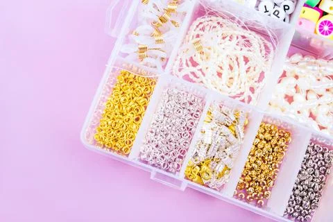 Flatlay of seed beads with tools for making jewelry Stock Photos