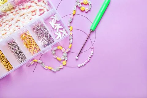 Flatlay of seed beads with tools for making jewelry Stock Photos