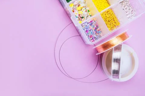 Flatlay of seed beads with tools for making jewelry Stock Photos